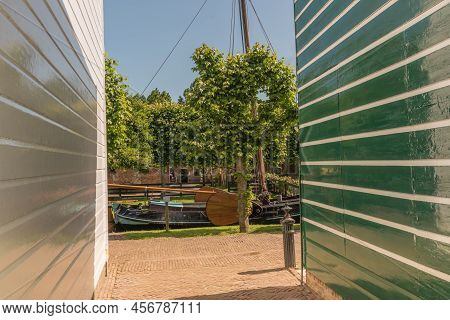 Enkhuizen, Netherlands, June 2022. View Through The Wooden Facades On A Historic Sailboat In Enkhuiz