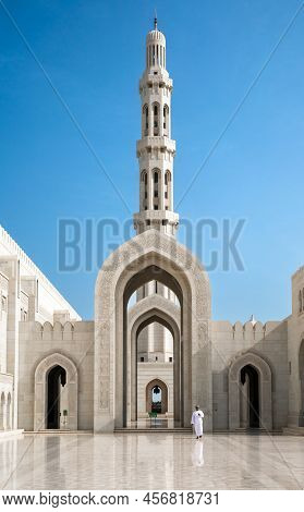 Muscat, Oman - 04.04.2018: Awe Inspiring Exterior Of Dultan Qaboos Grand Mosque. White And Orange Ma