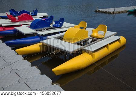 Many Pedalo Accosted In Water Quay With Colorful Pedal Boats Summer Sport Holiday