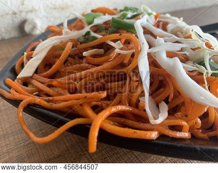 Vegetarian Schezwan Noodles Or Vegetable Hakka Noodles Or Chow Mein In Bowl. Schezwan Noodles Is Ind