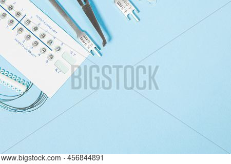 A Set Of Special Tools For An Orthodontist To Install Braces For A Patient. Orthodontic Arcs, Ligatu