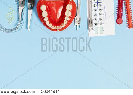 A Set Of Special Tools For An Orthodontist To Install Braces For A Patient. Orthodontic Arcs, Ligatu