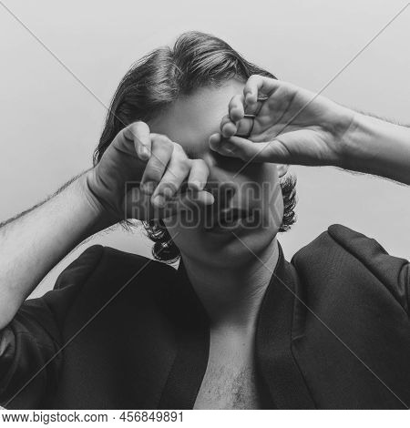 Portrait Of Young Handsome Man Posing In Black Jasket. Black And White Photography