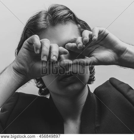 Portrait Of Young Handsome Man Posing In Black Jasket. Black And White Photography