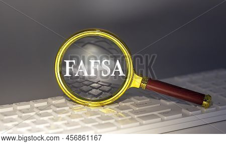 Fafsa Text On Magnifier On Keyboard, Business Concept