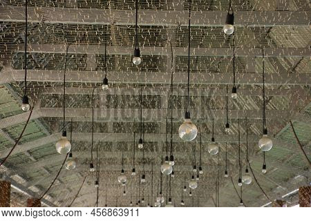 Art Vintage And Retro Lamp Led Lighting Hanging On Roof In Architecture Building Of Classic Coffee S