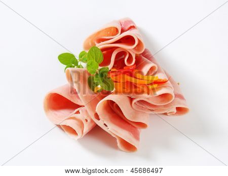 jamón doblada con pimientos en vinagre y orégano