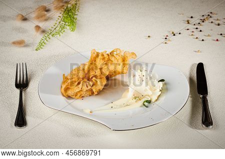 Deep-fried Meat With Mashed Potatoes On A Beautifully Draped Table