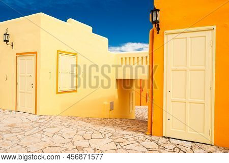 Orange Greek Mediterranean Houses. Greek Village In Balatonfured