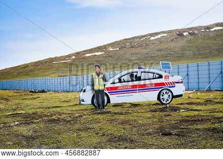 Kars, Turkey - 20th May, 2022: Cardboard Police Imitation By Road In Turkey Countryside. Traffic Pol