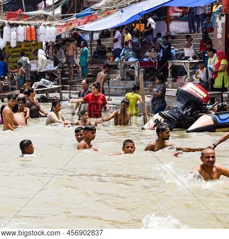 Garh Mukteshwar, Uttar Pradesh, India - June 11 2022 - People Are Taking Holy Dip On The Occasion Of