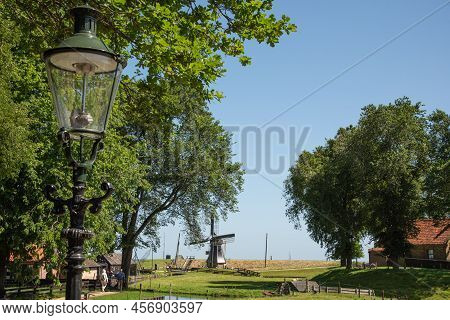 Enkhuizen, Netherlands. June 2022. The Countryside With The Mill At The Zuiderzee Museum In Enkhuize