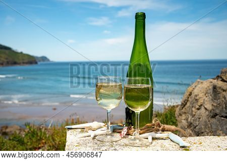 Tasting Of Txakoli Or Chacolí Slightly Sparkling Very Dry White Wine Produced In The Spanish Basque