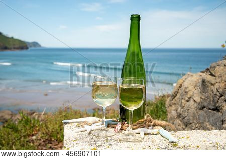 Tasting Of Txakoli Or Chacolí Slightly Sparkling Very Dry White Wine Produced In The Spanish Basque