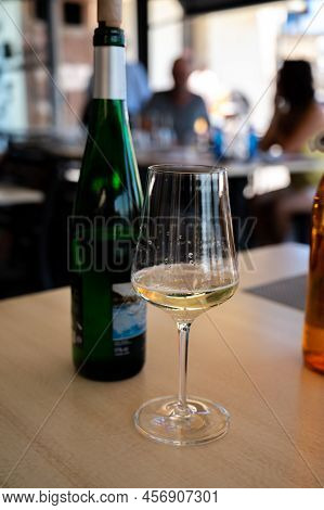 Drinking Of Txakoli Or Chacolí Slightly Sparkling Very Dry White Wine Produced In Spanish Basque Cou