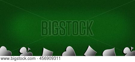Different Card Suits, On A Green Background. Copy Space. Place For Text. Gambling Concept. Gambling 