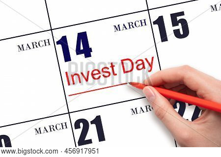 14th Day Of March. Hand Drawing Red Line And Writing The Text Invest Day On Calendar Date March 14. 