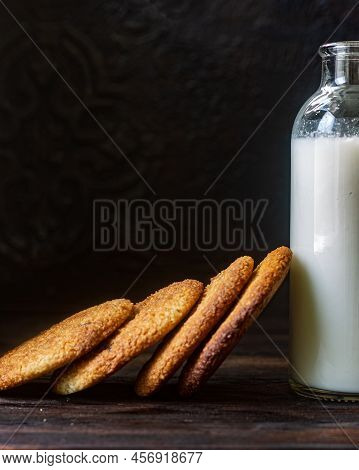 Delicious Peanut Cookies And Glass Bottle Of Milk. Lowkey Photo.