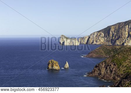 Cliff Landscape In The Mediterranean Sea With Different Colors In The Village Of Nebida, Sardinia, I