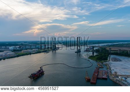 Aerial View Of The Cochrane Bridge Over The Mobile River On The Alabama Gulf Coast At Sunset