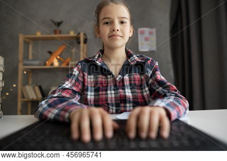 Portrait Of Joyful Girl Studying Online, Using Laptop At Home, Webcam Point Of View Pov. Kid Having 