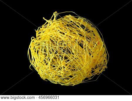 Yellow Plastic Ball Isolated On Black. Close Up