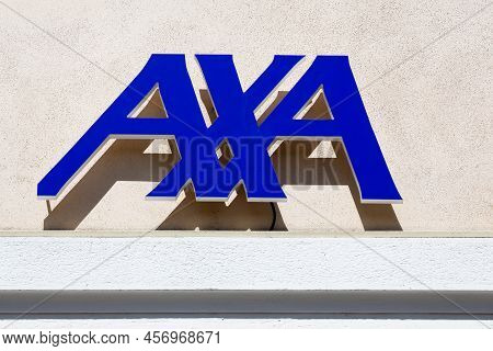 Villefranche, France - April 9, 2022: Axa Insurance Logo On A Wall. Axa Is A French Multinational In