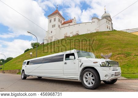 White Limousine Hummer H3 At The City Street