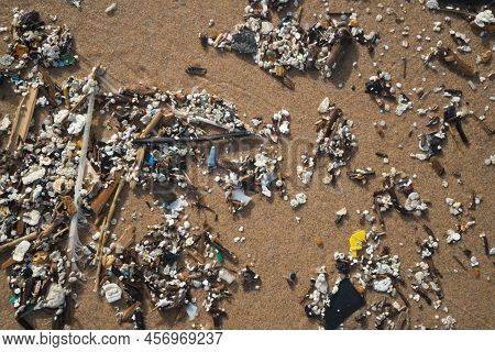 Plastic Waste And Micro Plastic Washed On The Shore Of The Atlantic Ocean