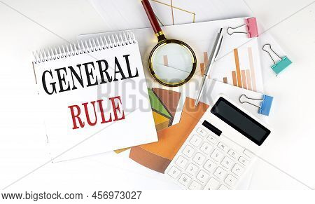White Notepad Text General Rule With Diagram,chart,calculator On White Background