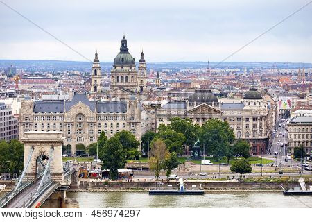 Budapest, Hungary - June 22 2018: View Of The Széchenyi Chain Bridge, The Gresham Palace, The Minist