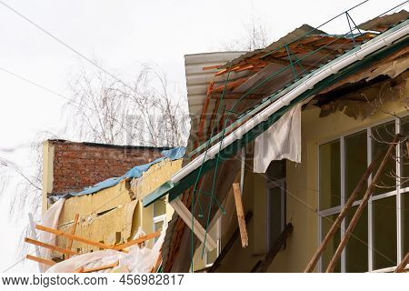 Roof Of A Building Torn Off By Strong Wind. Damage Caused By Storm
