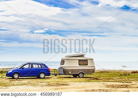 Caravan Trailer Camping On Seashore. Capicorb, Valencia Region Spain. Vacation With Mobile Home.