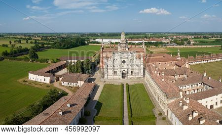Aerial Shot Of The Certosa Di Pavia At Sunny Day, Built In The Late Fourteenth Century, Courts And T