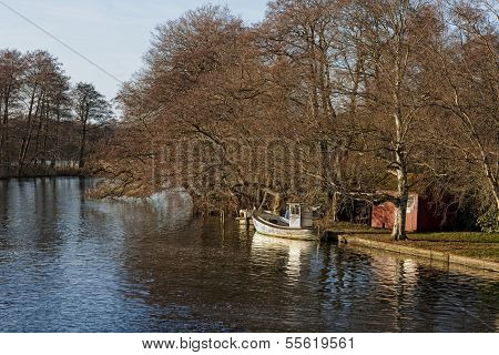 Small Fishing Boat In The Lake