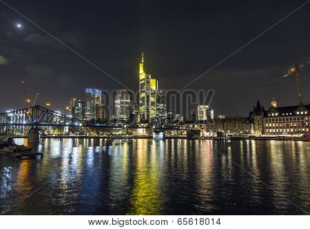 Illuminated  Buildings And Skyline At Night In Frankfurt