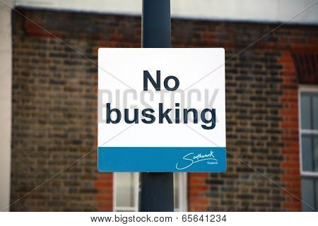 No Busking Sign