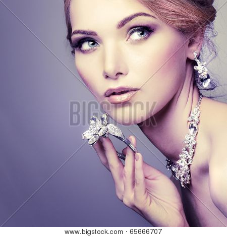 A photo of sexual beautiful girl in a wedding-dress is in fashion style. Wedding decorations