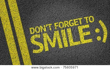 Don't Forget to Smile written on the road