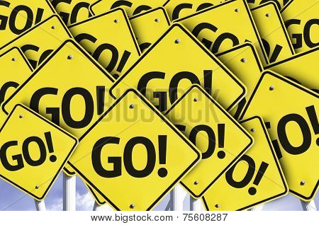 Go! written on multiple road sign