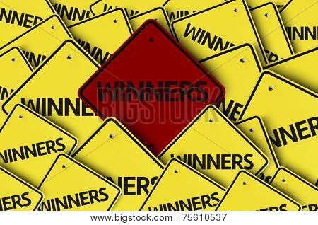 Winners written on multiple road sign