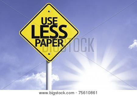 Use Less Paper road sign with sun background 