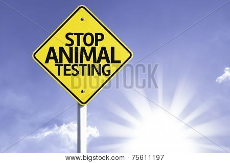 Stop Animal Testing road sign with sun background 