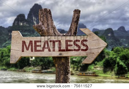 Meatless wooden sign with a forest background 