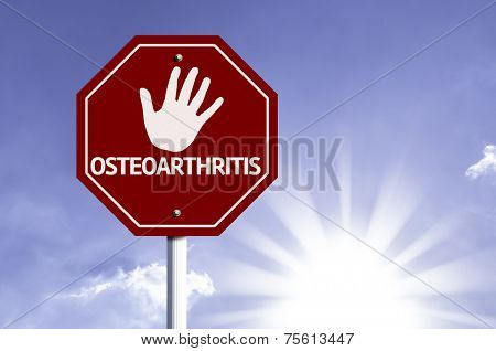 Stop Osteoarthritis (OA) red sign with sun background 