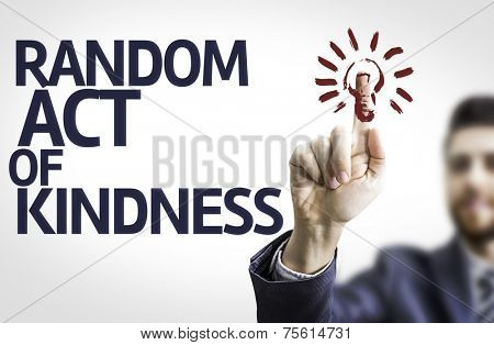 Business man pointing to transparent board with text: Random Act of Kindness