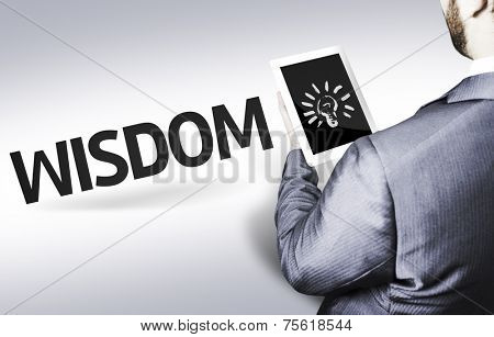 Business man with the text Wisdom in a concept image