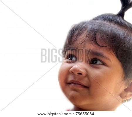 Happy Smiling Indian Kid Or Child Smiling And  Looking Up