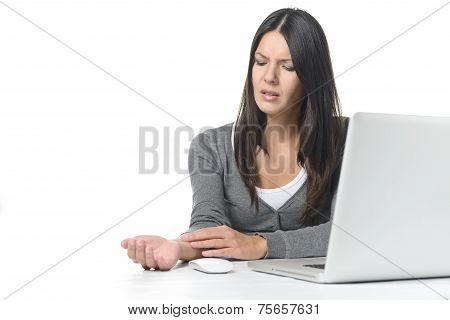 Young Businesswoman Rubbing Her Wrist