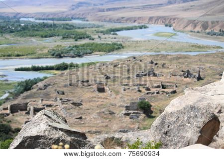 ruins and bend of river, view from cave ancient pagan city Uplistsikhe